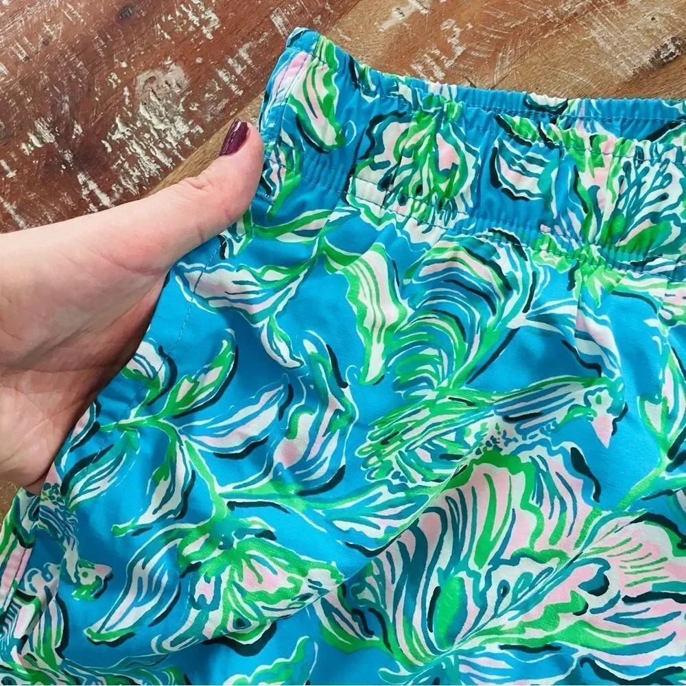 NWT Lilly Pulitzer Men's Capri Swim Trunks in Chick Magnet Cumulus Blue.